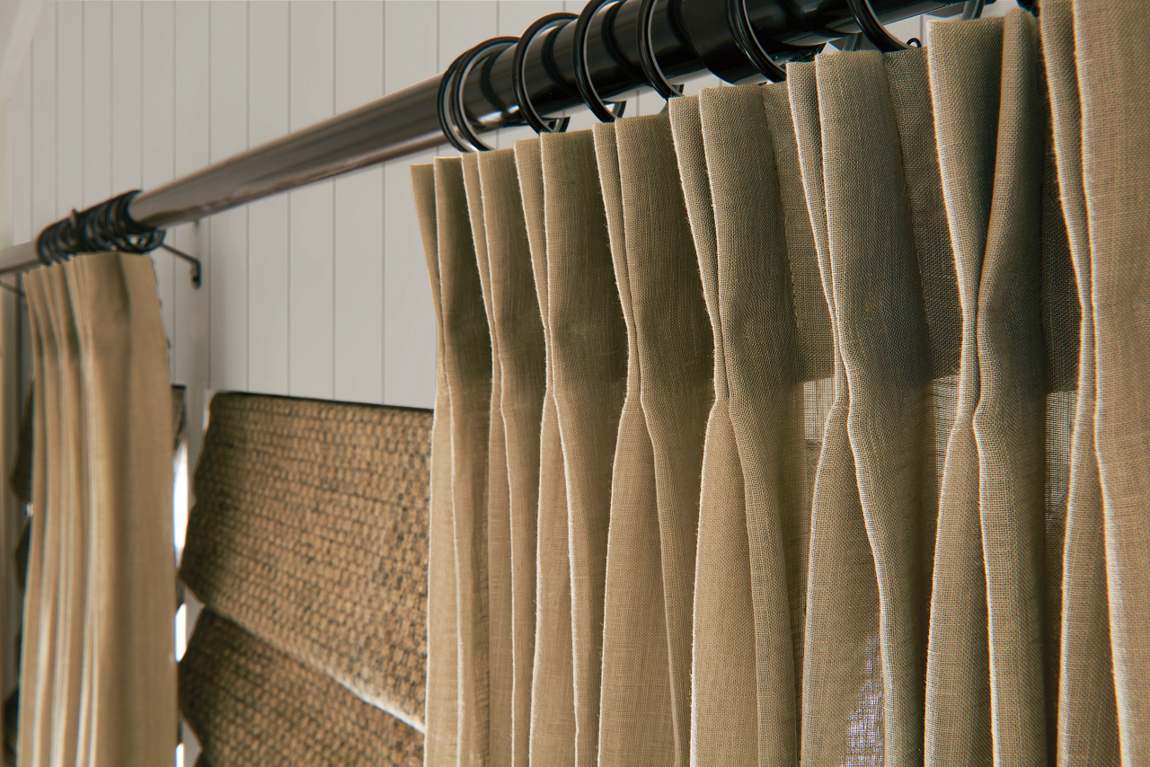 Elegant drapery panels framing a window with natural light